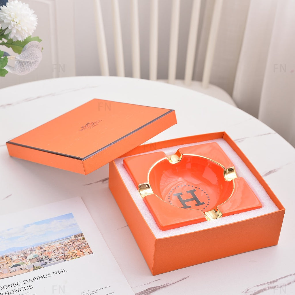 Orange H ashtray 