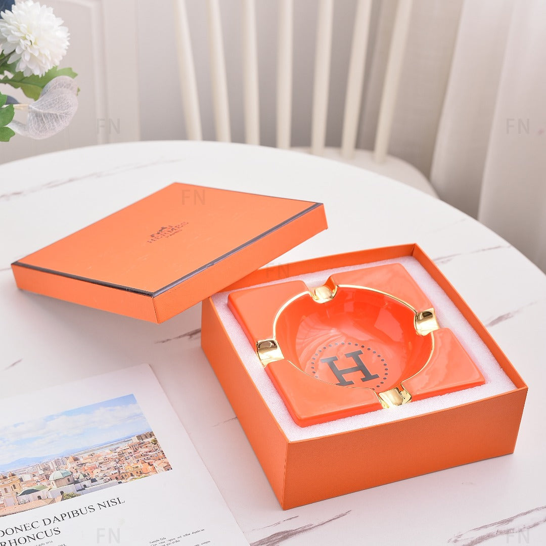 Orange H ashtray 